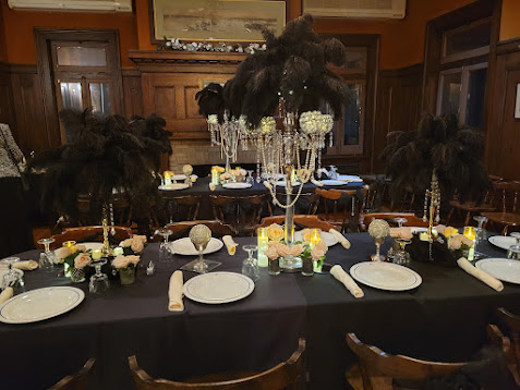 The Thames Club formal dining room set for a private dinner