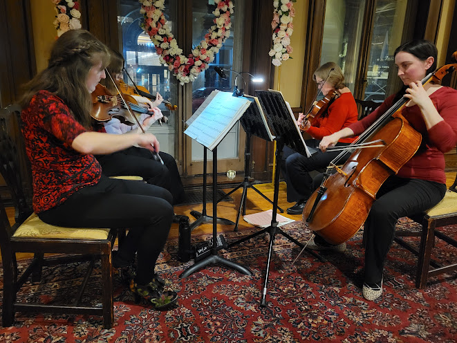 String quartet performing at the Thames Club