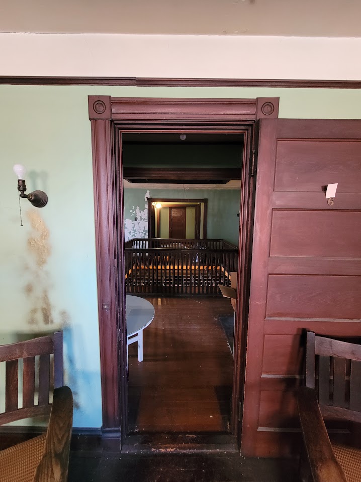 Top floor during restoration — framing and stabilization work in progress